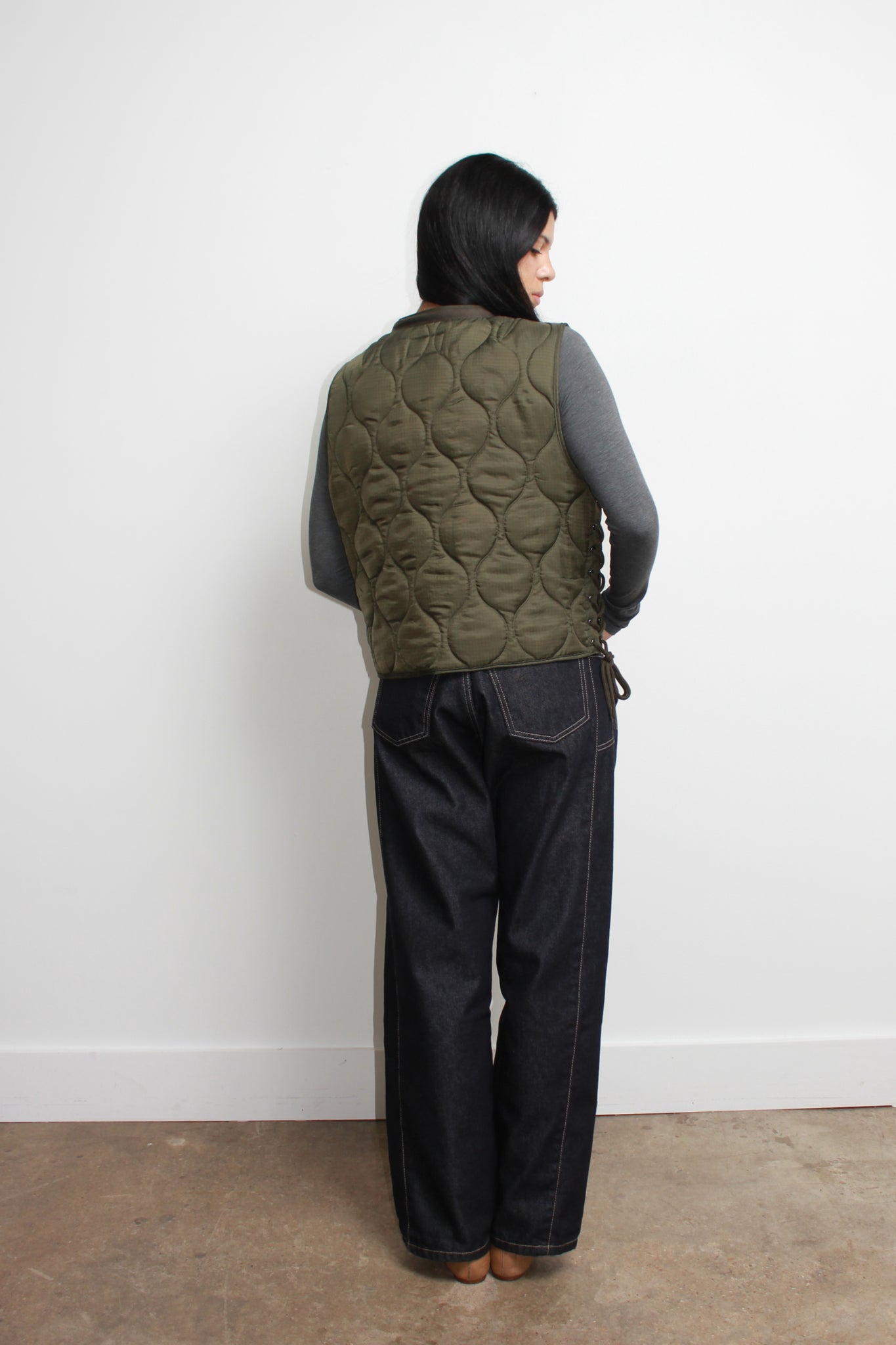 Grommet lace up quilted vest