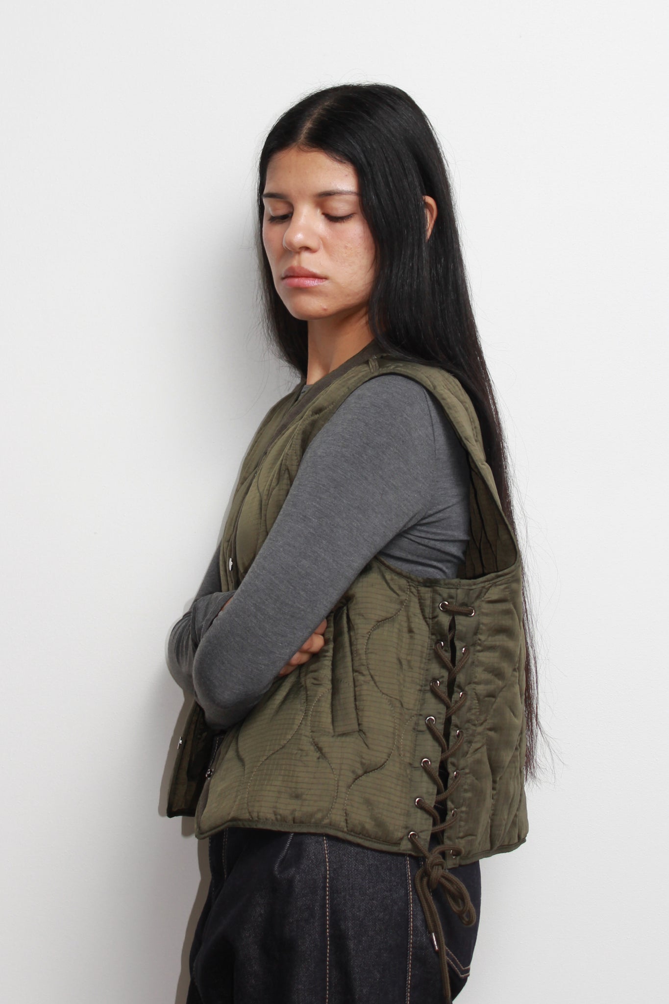 Grommet lace up quilted vest