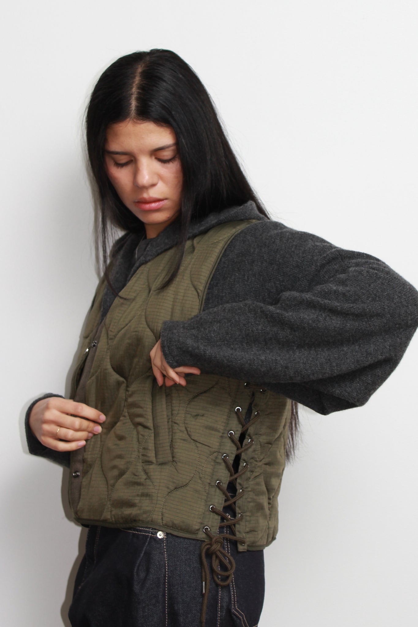 Grommet lace up quilted vest