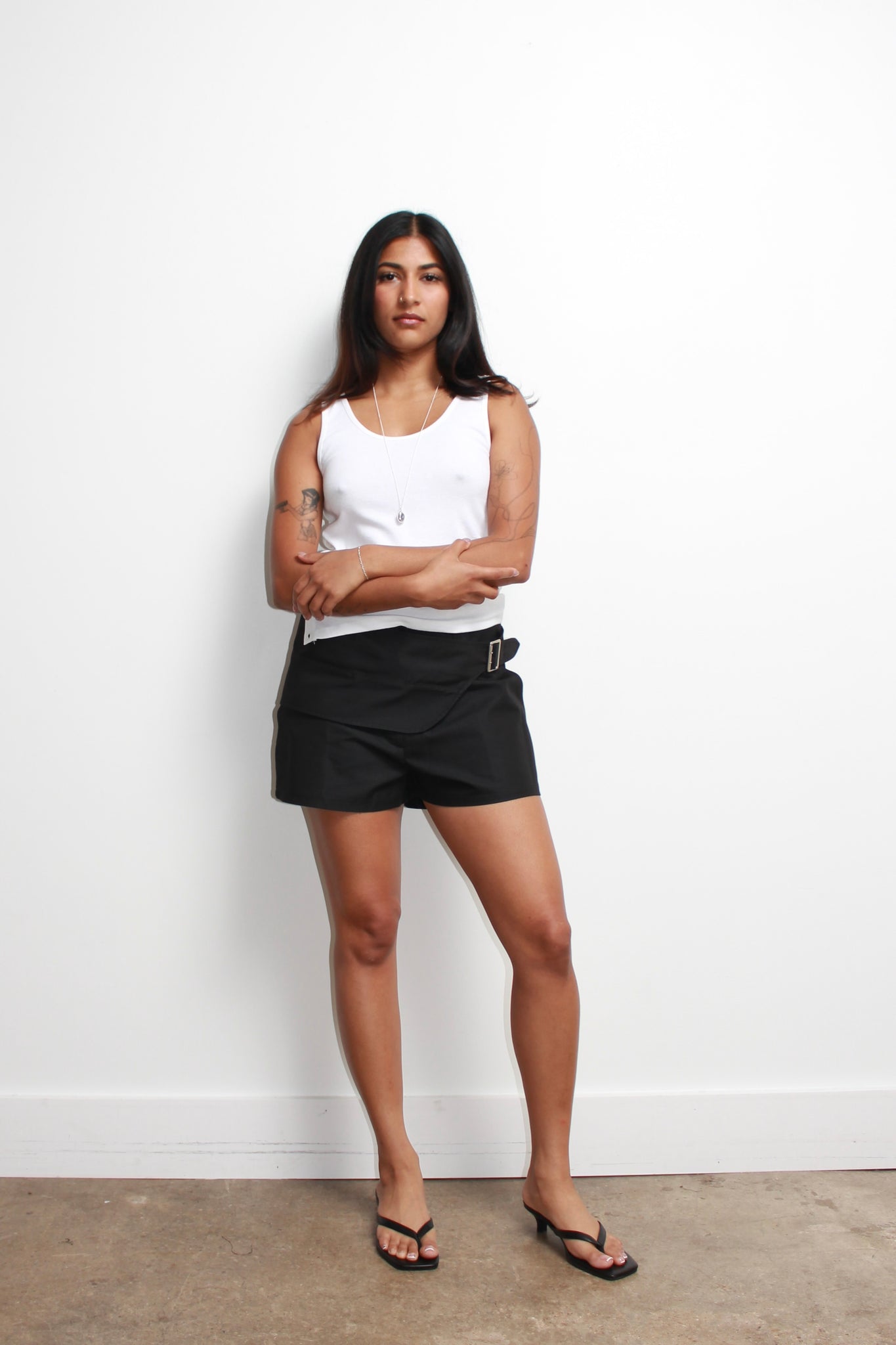 Side Button Sleeveless Top in White