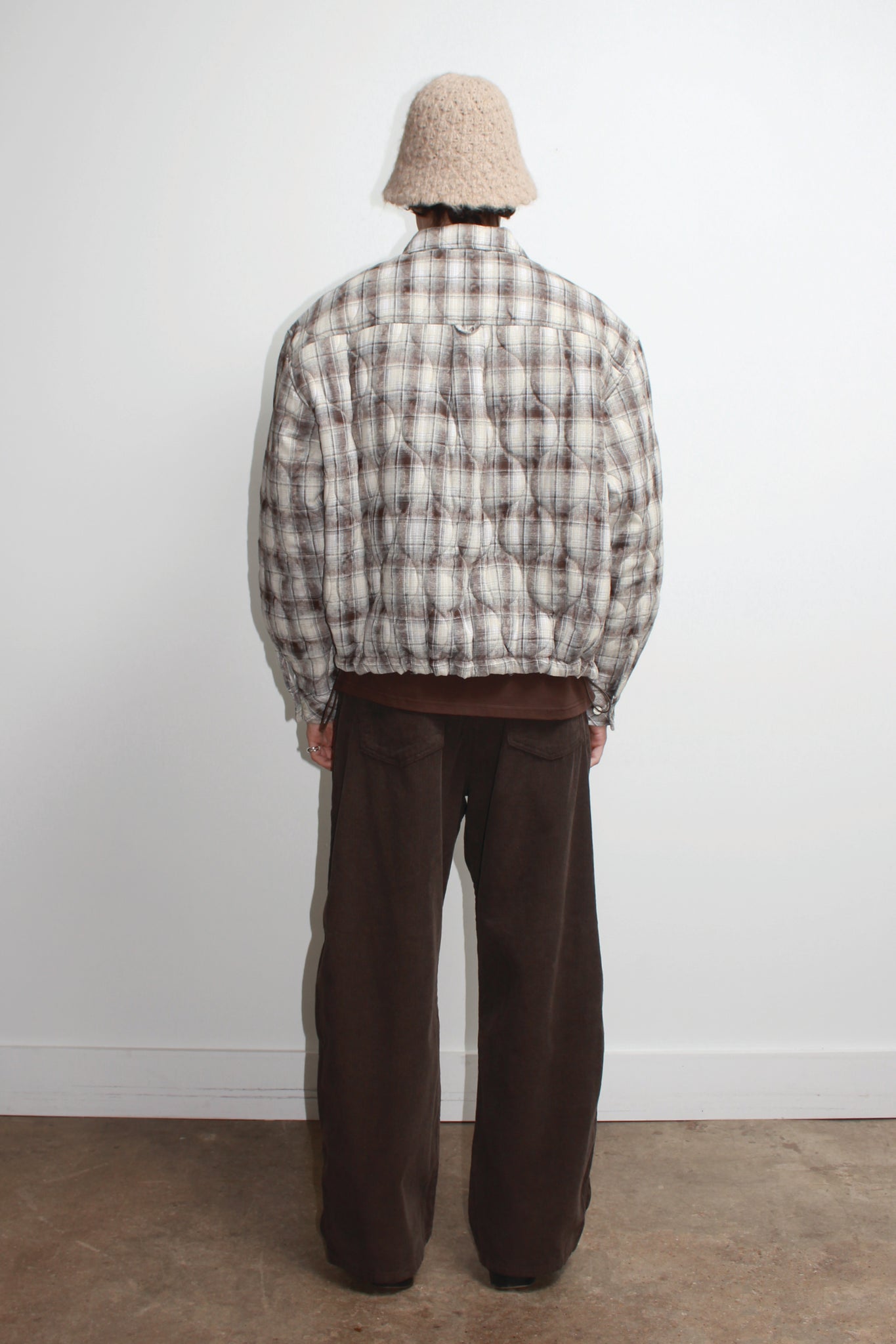 Fuzzy Buckle Bucket Hat in Beige