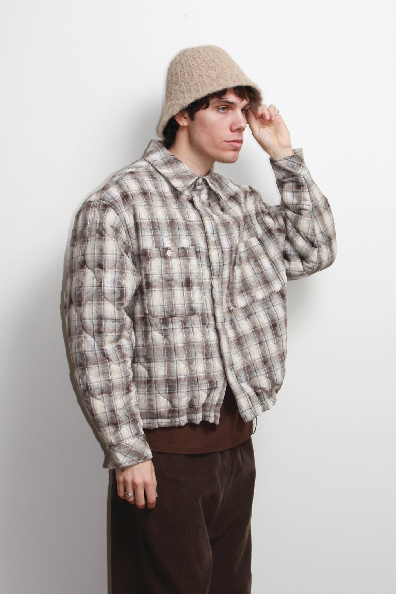 Fuzzy Buckle Bucket Hat in Beige