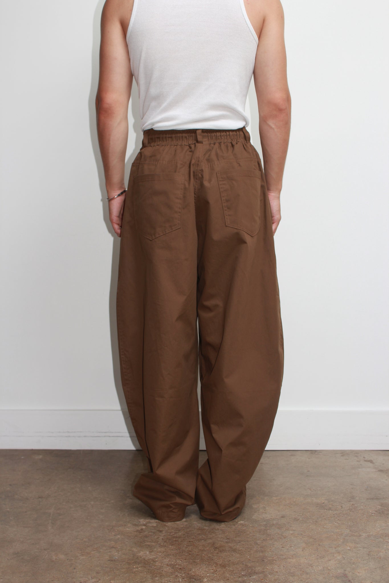 Settle Curved Barrel Leg Pant in Brown