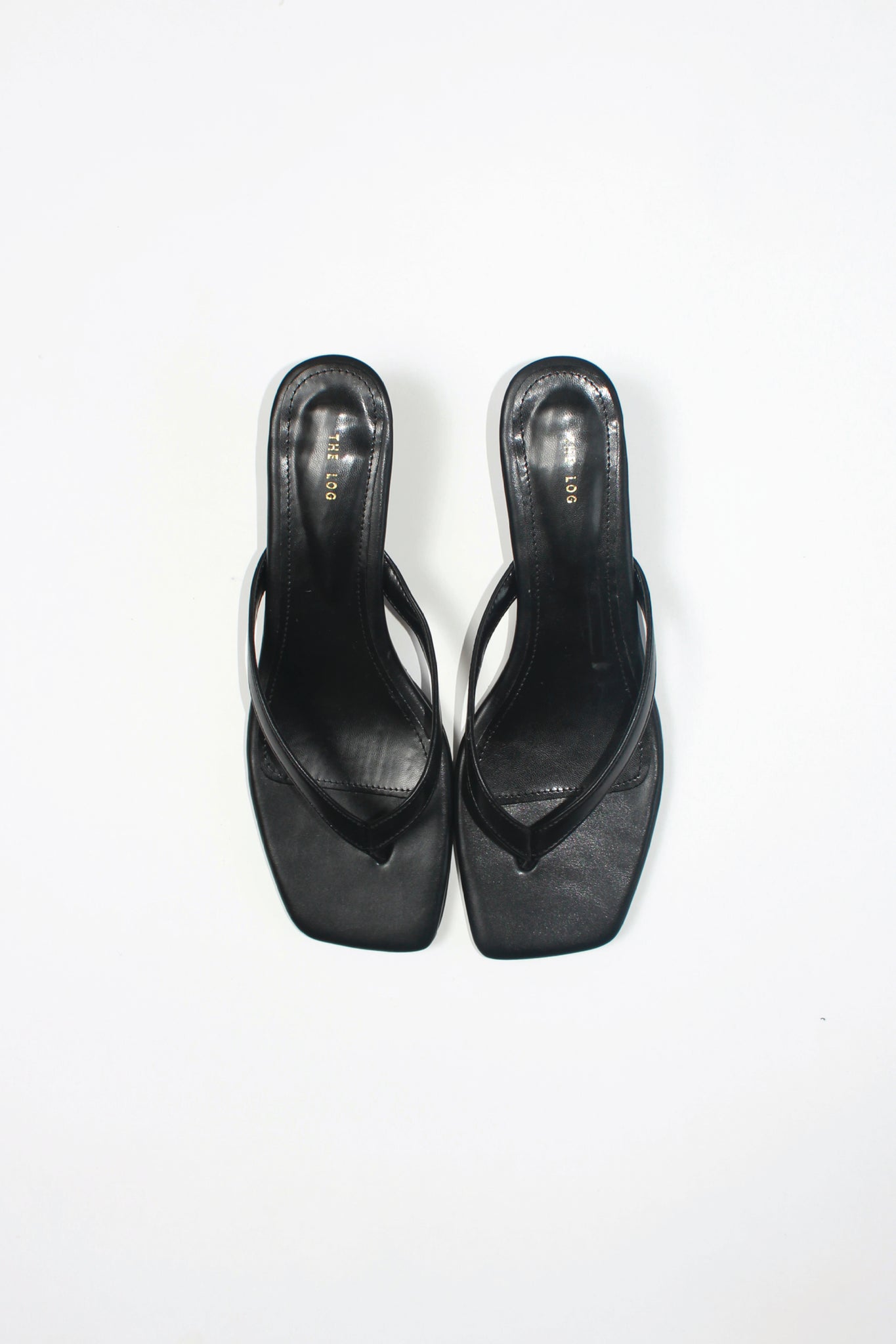 Log Flip Flop Heeled Sandals in Black