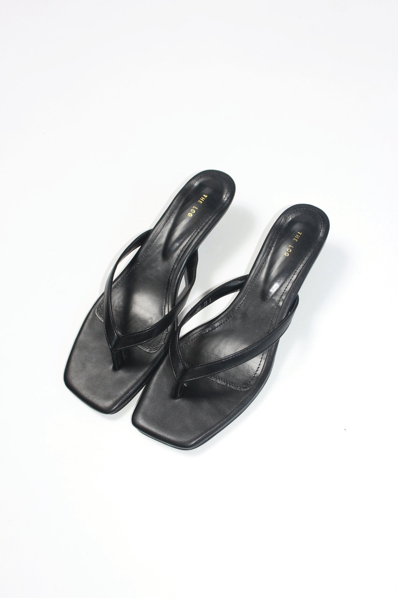 Log Flip Flop Heeled Sandals in Black