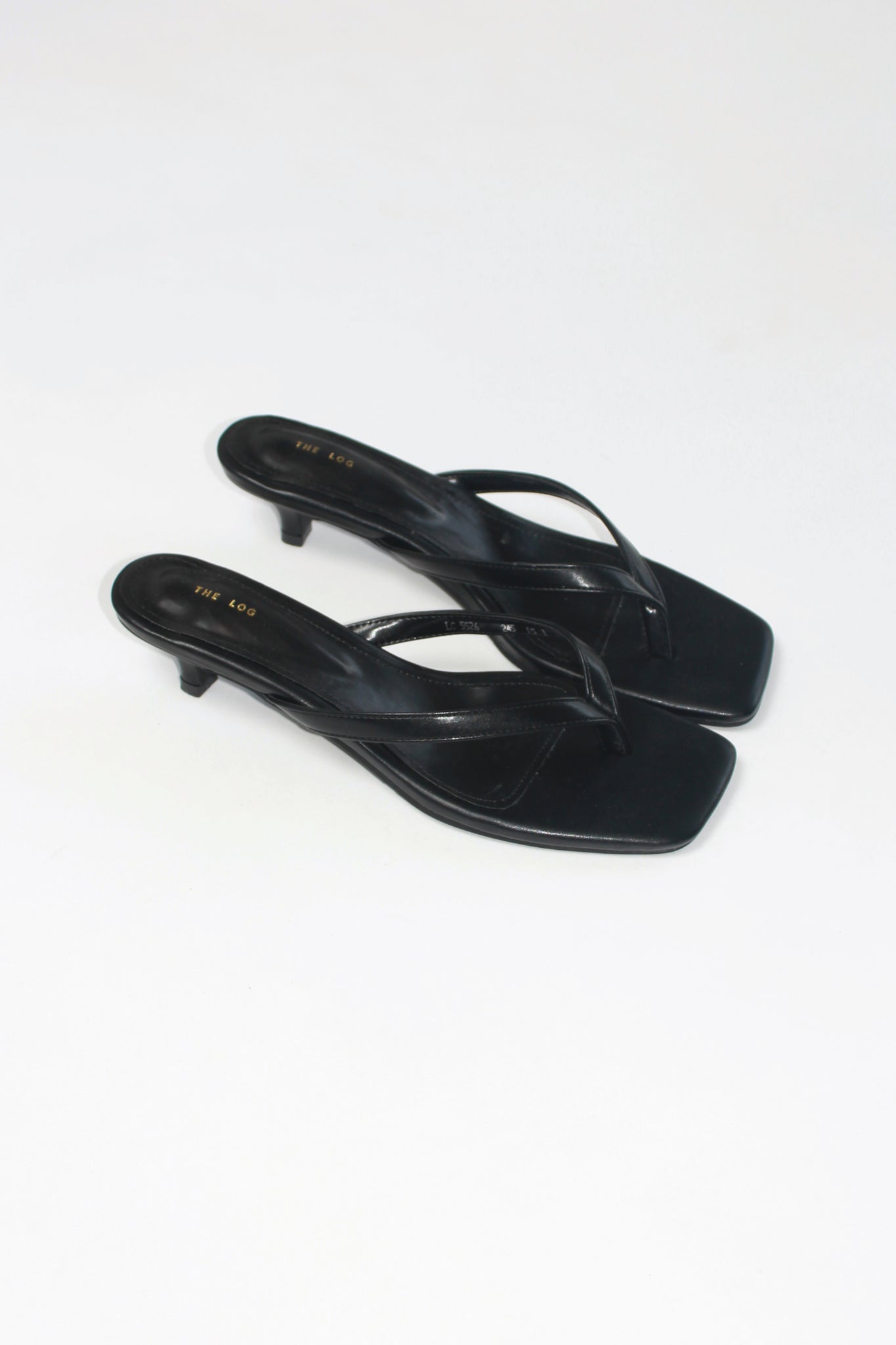 Log Flip Flop Heeled Sandals in Black