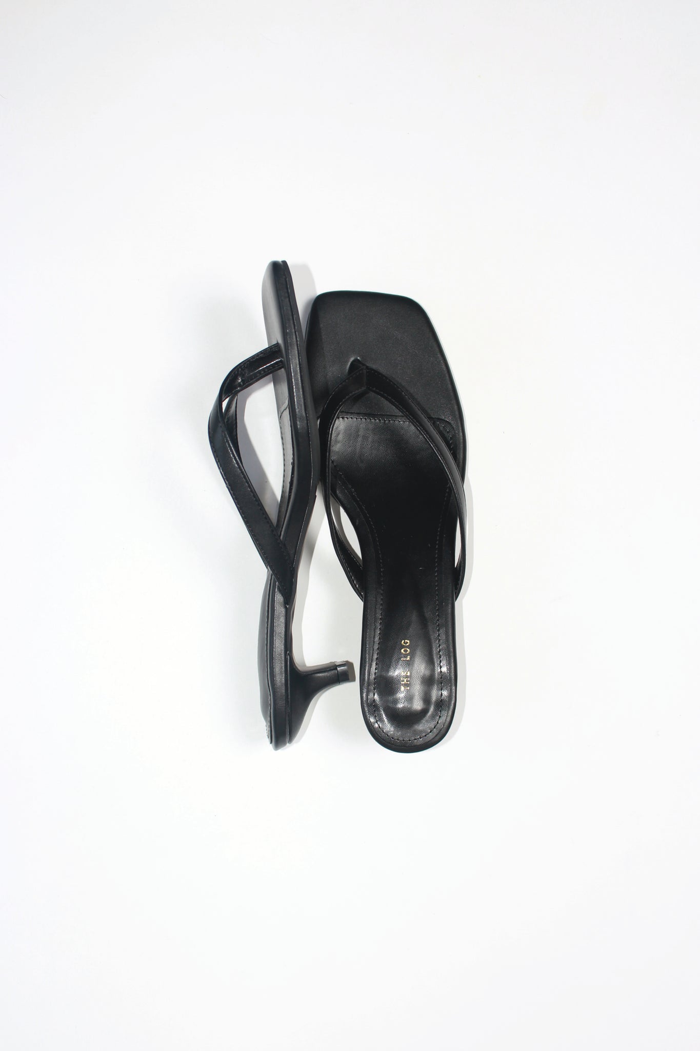 Log Flip Flop Heeled Sandals in Black