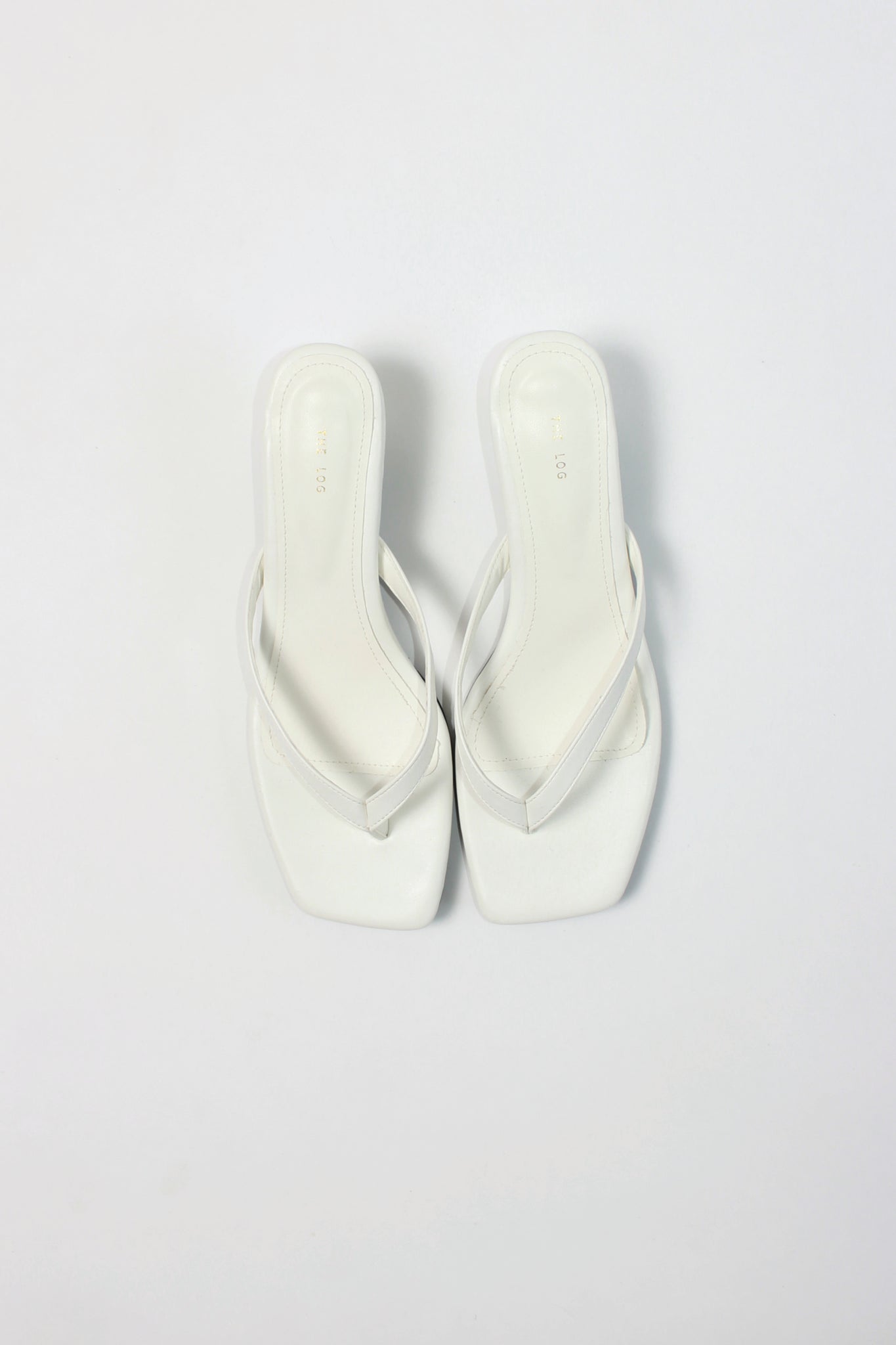 Log Flip Flop Heeled Sandals in White