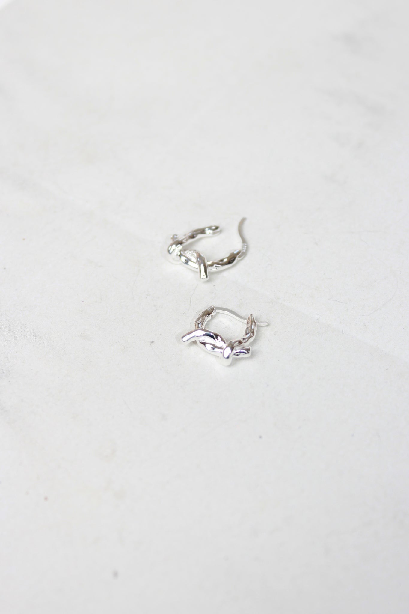 Rough Twist Knot Earring in Silver