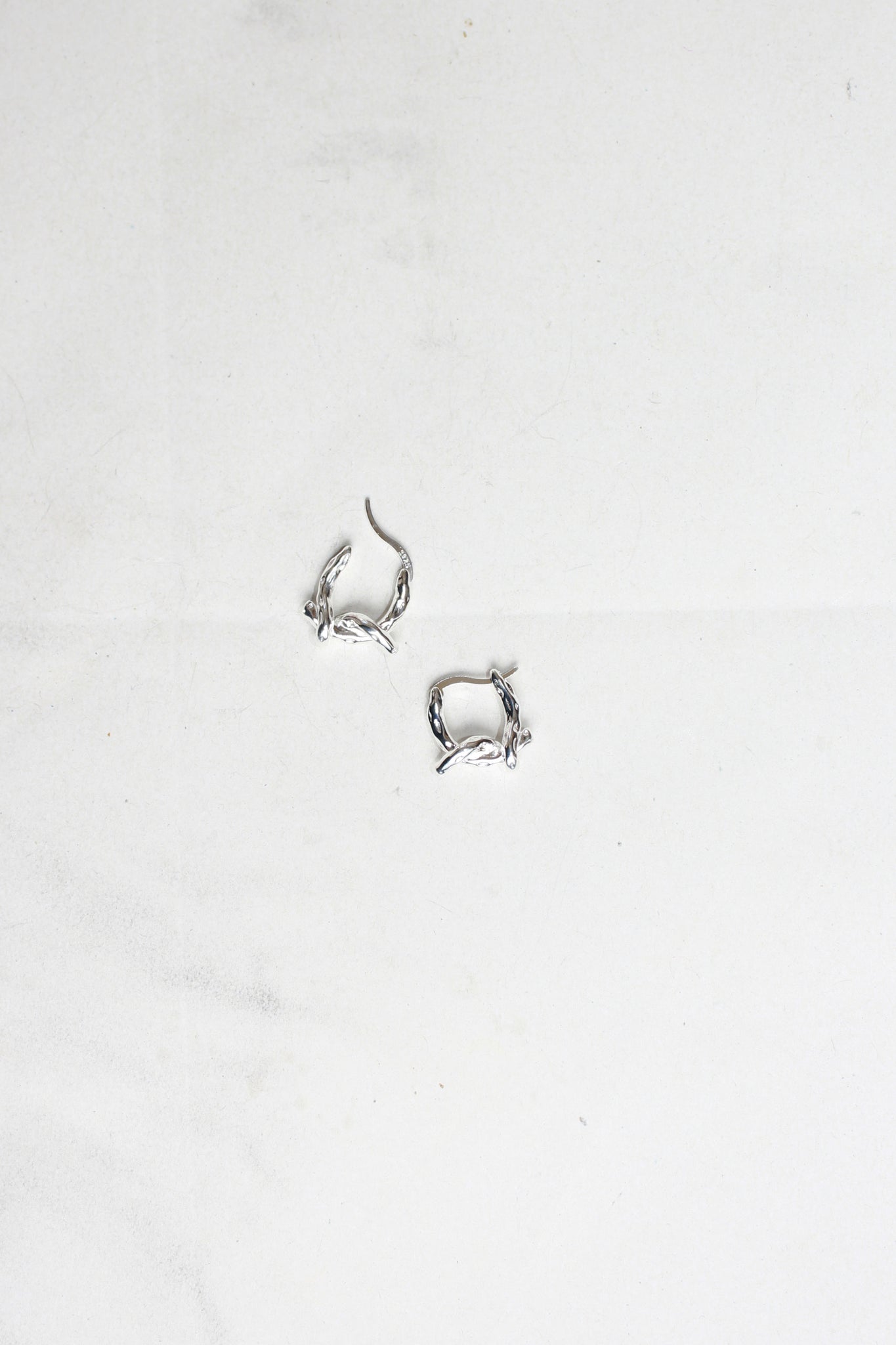 Rough Twist Knot Earring in Silver