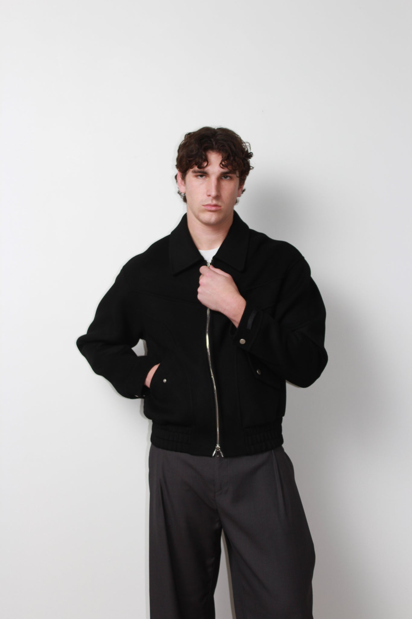 Curved Wool Bomber Jacket in Black