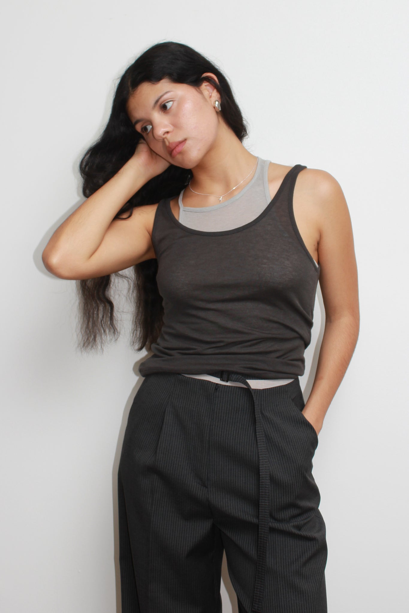 Tear Sleeveless Layered Top in charcoal