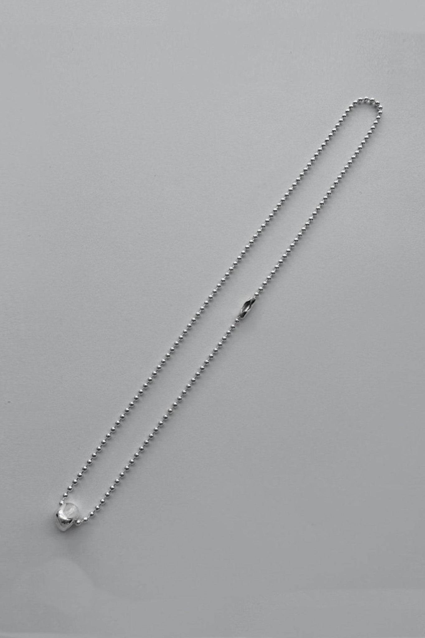 R Pebble necklace in Sterling Silver